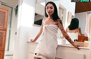 Petite asian toddler masturbates in shower not later than solo occasion