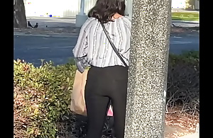 Cute young girl with a nice butt walking chit shopping