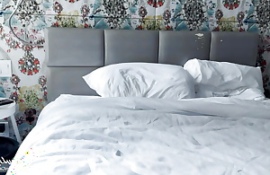 Procreator and stepson share a bed in a hotel room