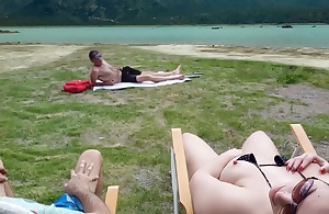 Voyeur masturbates on the beach in front of my husband