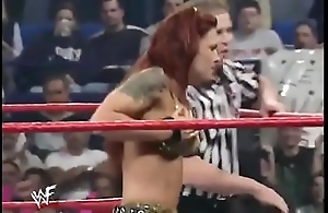 Wwe leading actress trish stratus defoliated fro brassiere & boxer shorts ( raw 10-23-2000 )