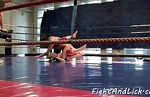 Dazzling lesbos wrestling in a torque
